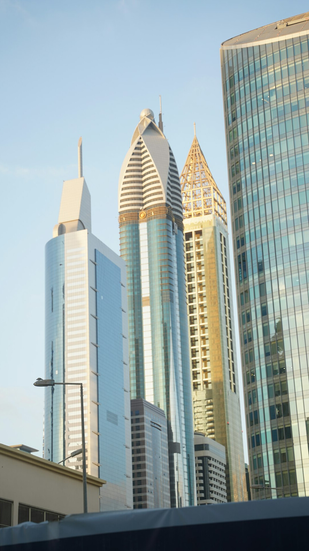 City skyline at dusk with illuminated office towers